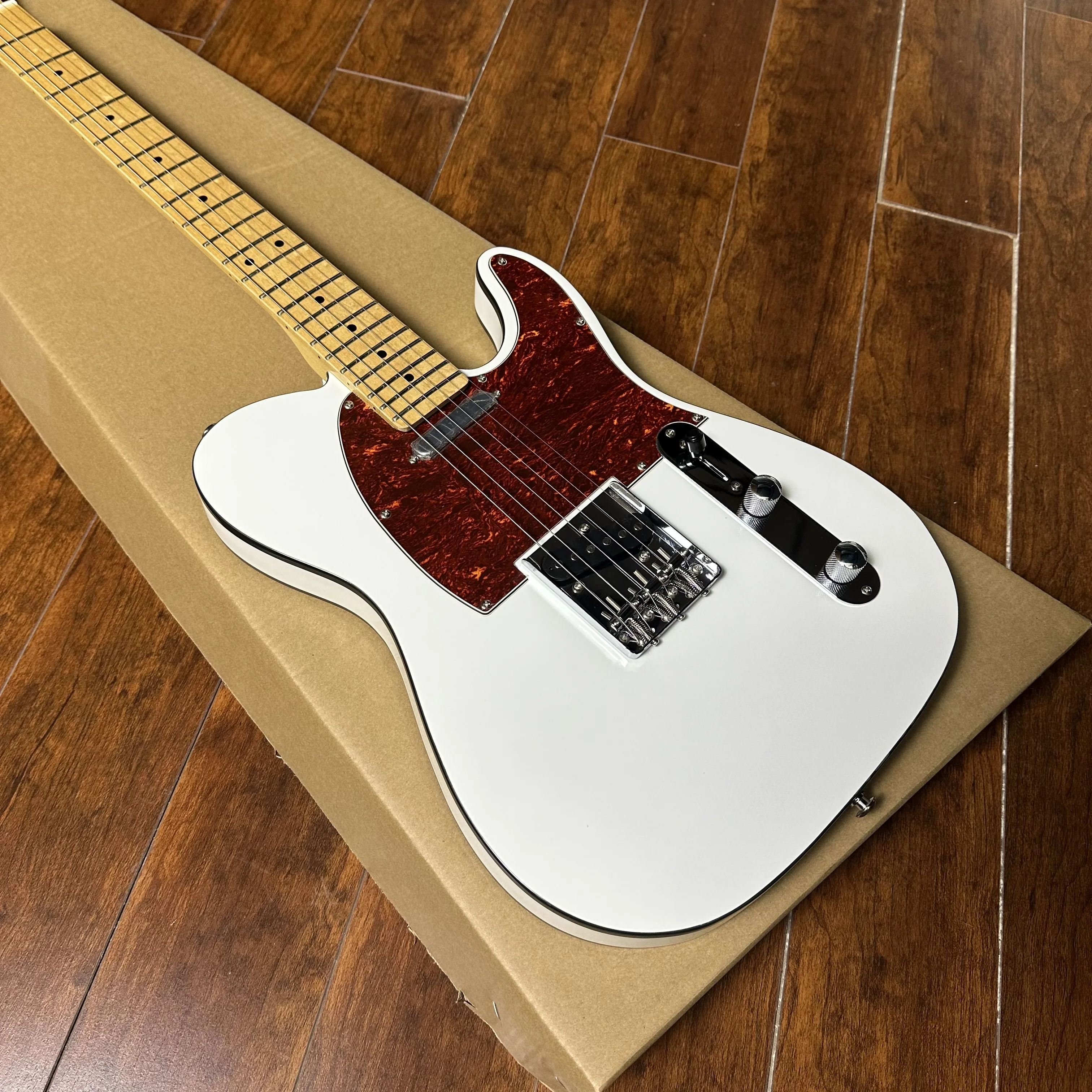 White TL electric guitar, red pearl guard, maple fingerboard, Black edging, free shipping