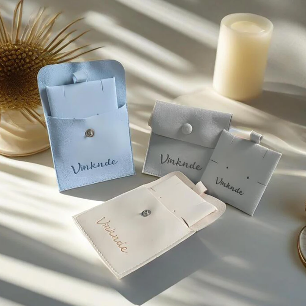 

Ivory Microfiber Button Jewelry Pouch With Holder Custom Logo Stamped Suede Jewelry Necklace Earrings Pouch With Insert Card Pad