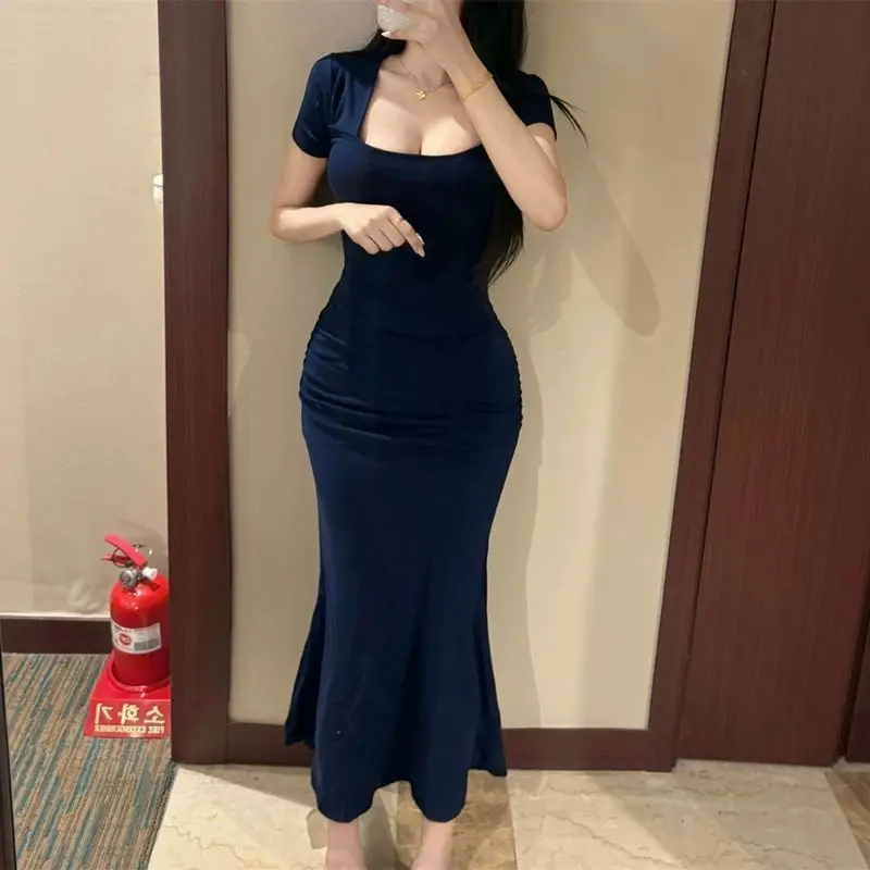 Venta al por mayor, vestidos lisos, vestido ajustado elástico elegante de verano para mujer, vestido largo de manga corta para vacaciones juveniles elegantes de calle para mujer