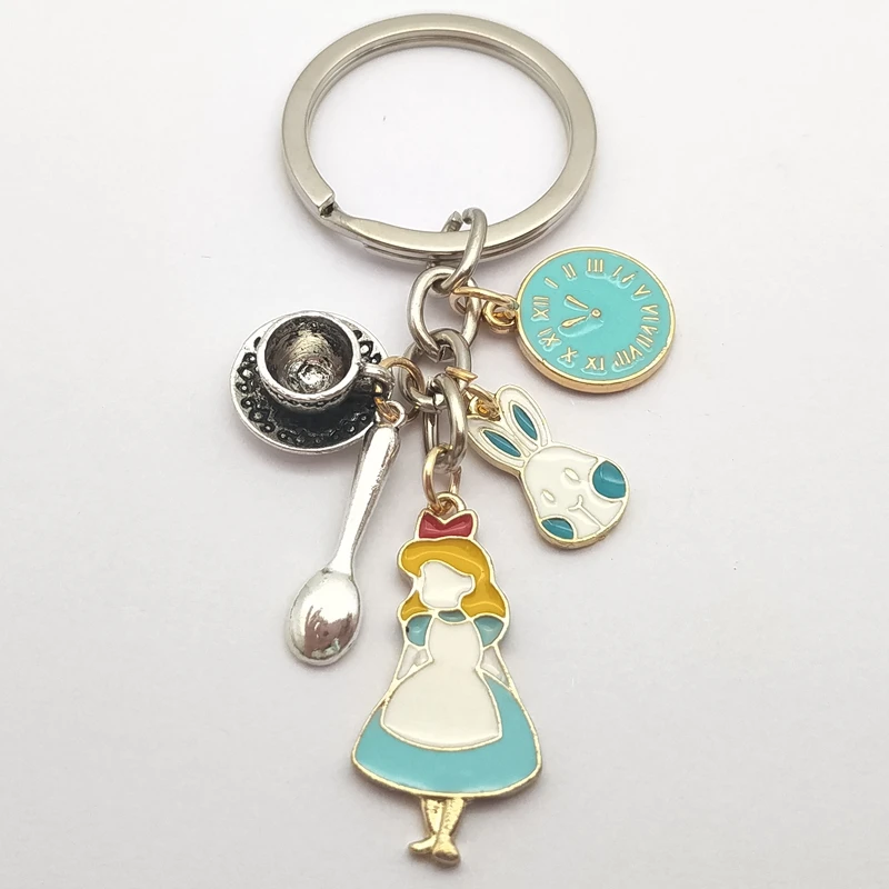 1 piece of high-quality fashion jewelry Alice in Wonderland keychain, coffee cup watch rabbit spoon keychain, clock keychain