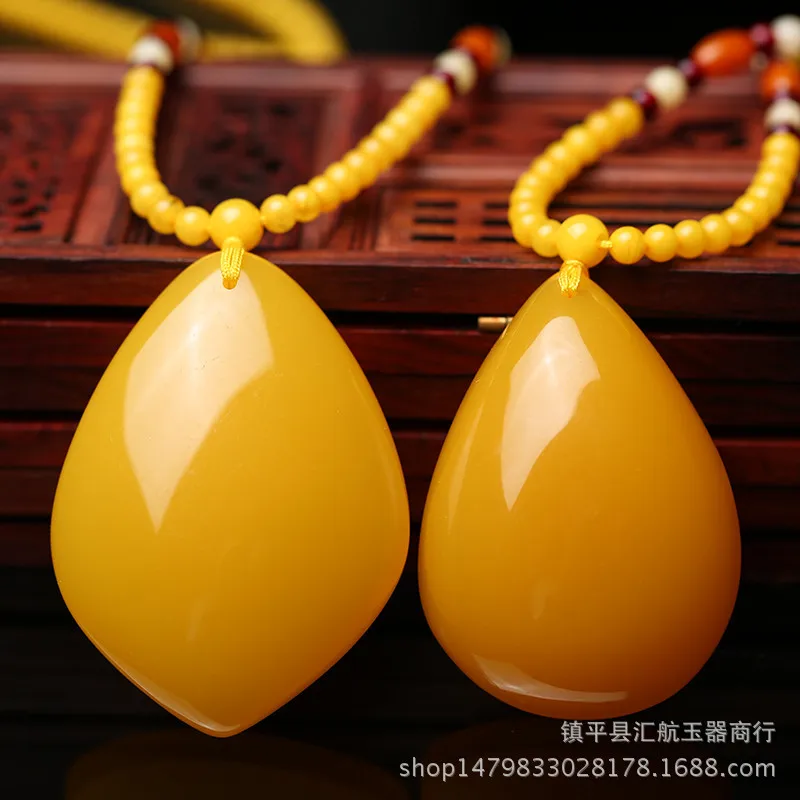 

Chicken Oil Yellow Pendant Water Drop Freeform Sweater Chain Necklace for Men and Women