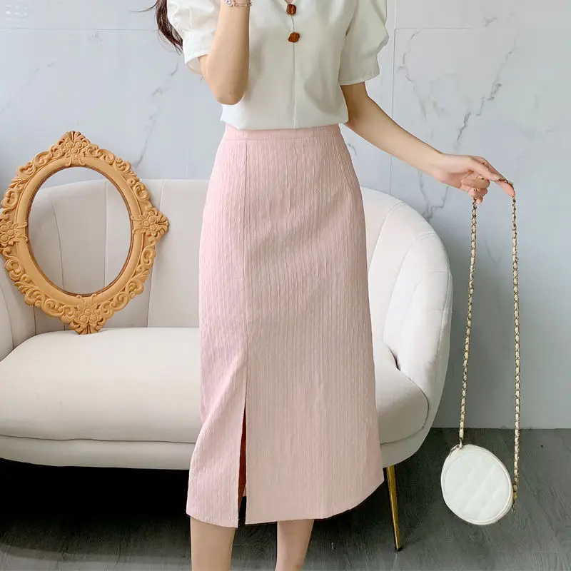 

Розовая жаккардовая юбка трапециевидной формы средней длины с боковым разрезом для женщин, простая корейская версия, универсальная темпераментная юбка с высокой талией