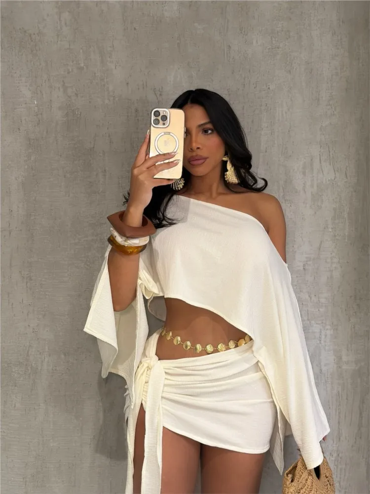 

Vacation Short Skirt Suit Summer Women's Loose Casual Solid Color Slanted Shoulder Short Top Strappy Beach Skirt Two-piece Set