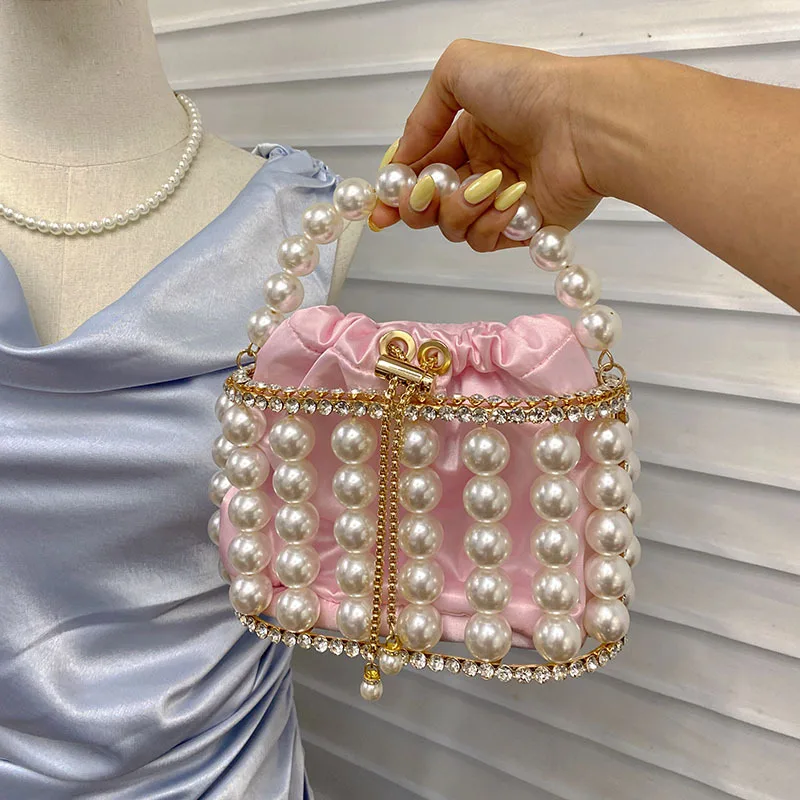 

Popular pearl diamond bird cage bag fashion high sense simple hollow messenger portable dinner bag
