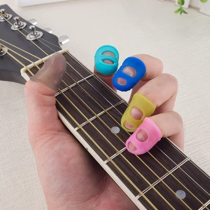 4Pcs Multifunctional Silicone Thimbles Guitar Finger Protector Hollowed Out Breathable Protective Finger Sleeve Crafts Sewing