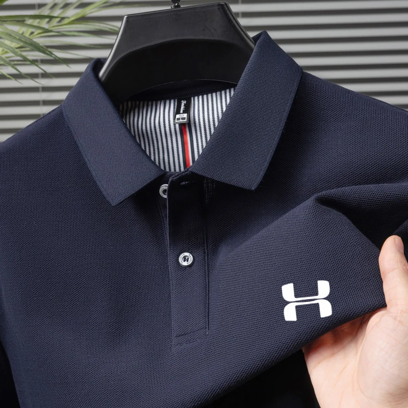 

The summer men's pure cotton short-sleeved polo shirt features a buttoned collar and exquisite embroidery patterns.