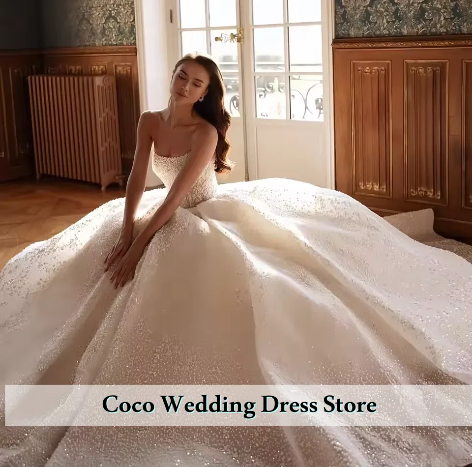 カスタマイズされたゴージャスなアップリケ輝くAラインウェディングドレスレースアップリケビーズクリスタルスパンコールブライダルガウンベスティドスデノビア