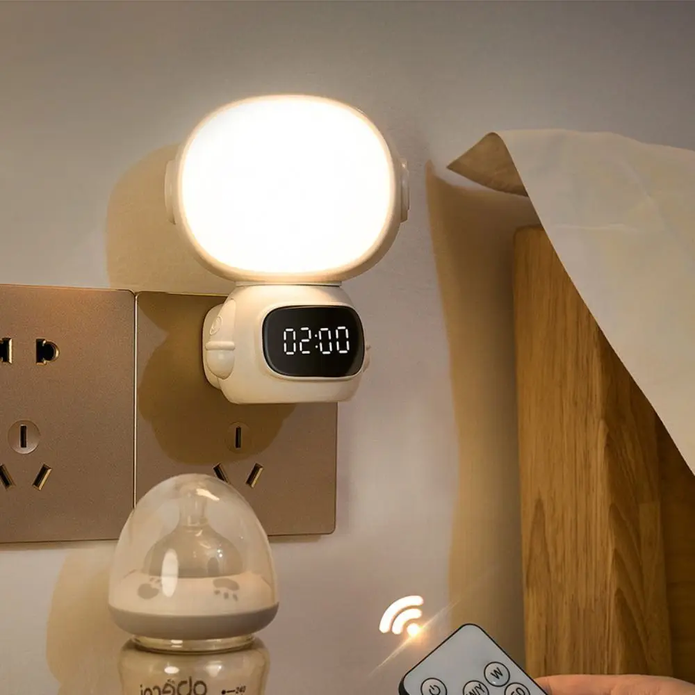 Orologio da astronauta a luce calda Luce notturna Orologio digitale Lampada da comodino dal design adatto ai bambini Luce ricaricabile USB per la cura degli occhi
