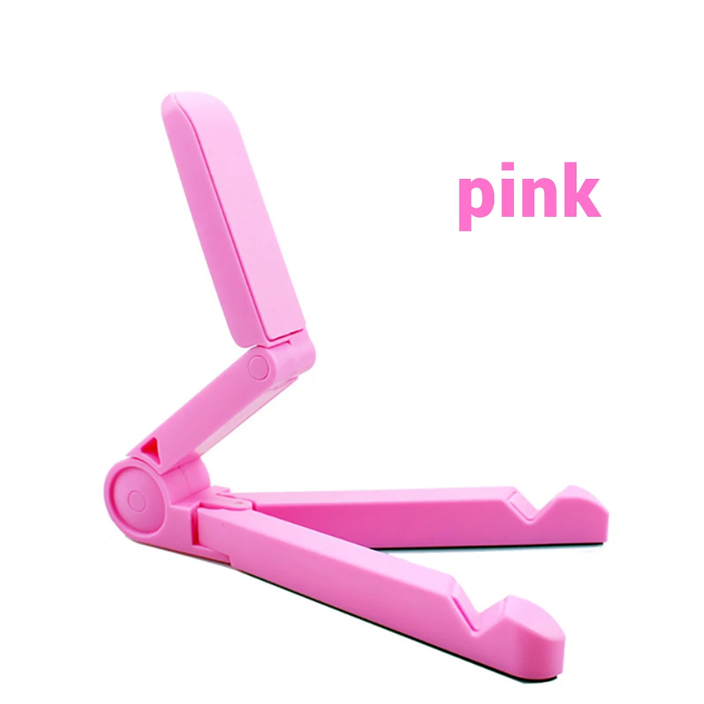adjustable foldable tablet stand for desk made of pink plastic with a sleek minimalist design.
