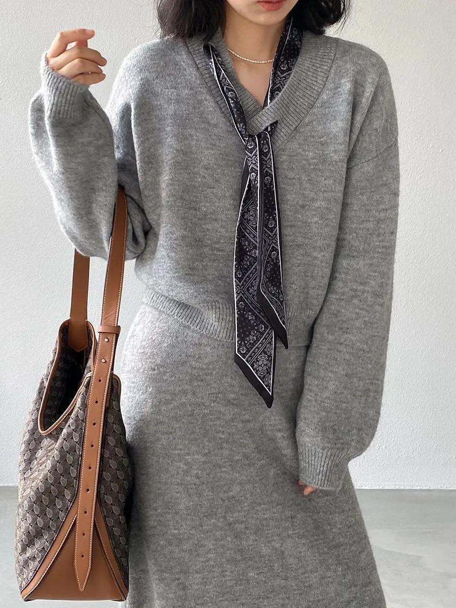 

Grey Fashion Knitted Skirt Set For Women Autumn/Winter With Silk Scarf, V-Neck Sweater And Half Length Skirt Two Piece Set