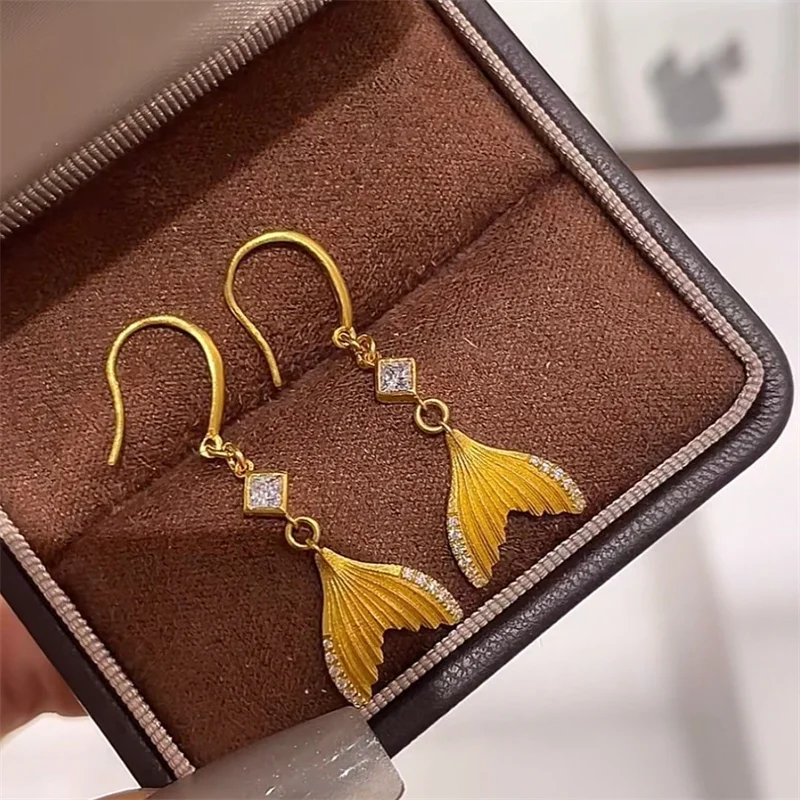 

New AU750 mermaid hook earrings with high-end feel, 18K goldfish tail versatile women's earrings, Valentine's Day birthday gift