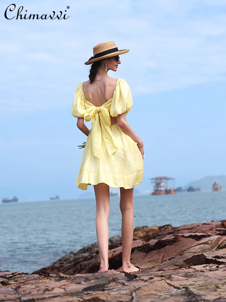 

French Elegant Princess Style V-neck Puff Sleeve Lace-up Bow Sexy Backless High Waist A-Line Yellow Short Beach Dress for Women