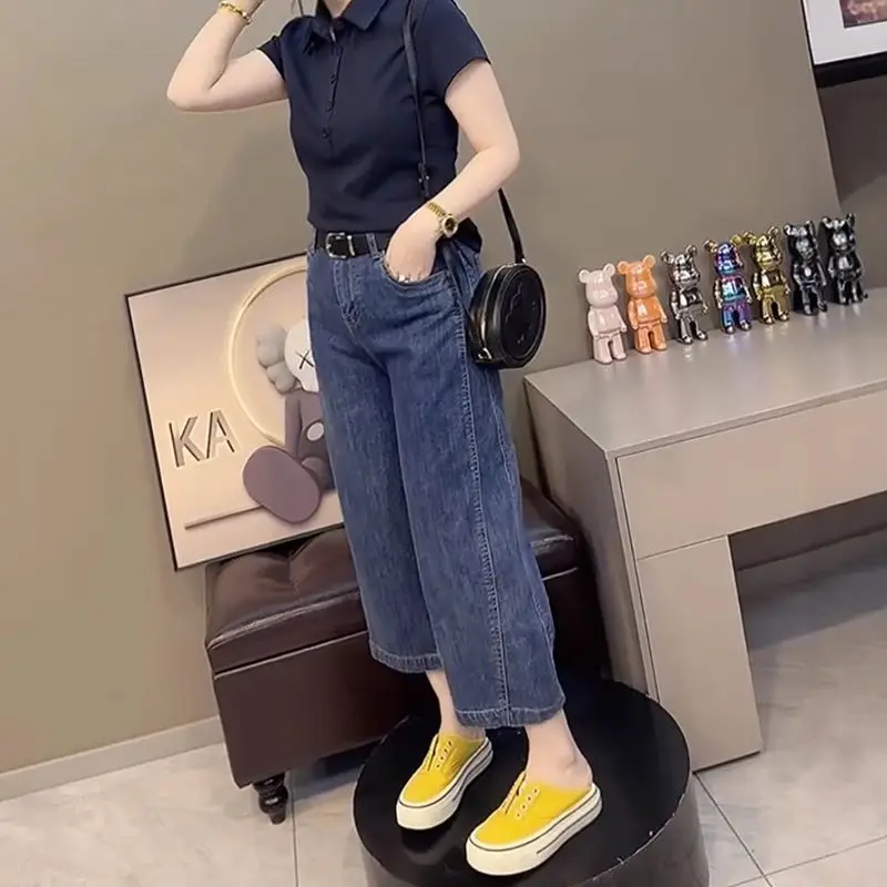 Retro simple curved knife jeans women in spring and summer new style high waist slimming casual nine point wide leg pants