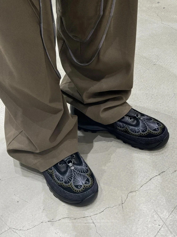 

Black Leather Lace Up Shoes Intricate Floral Embroidery Pattern Design Stylish Artistic Footwear for Casual Statement Making