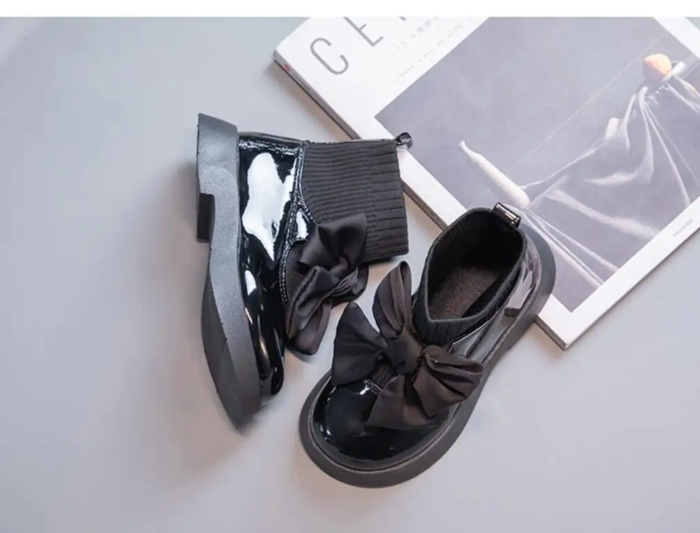 Neue Schwarze kinder Stiefel Mode PU Solid Black Bogen Mädchen Uniform Frühling Herbst Weichen boden Kinder Schwarz Stricken Schule socken Schuhe