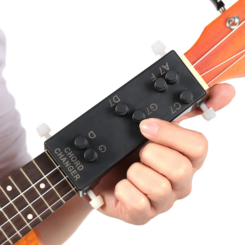 1pcs-guitar-auxiliary-ukulele-guitar-chord-auxiliary-electric-guitar-one-button-chord-instrument-accessories