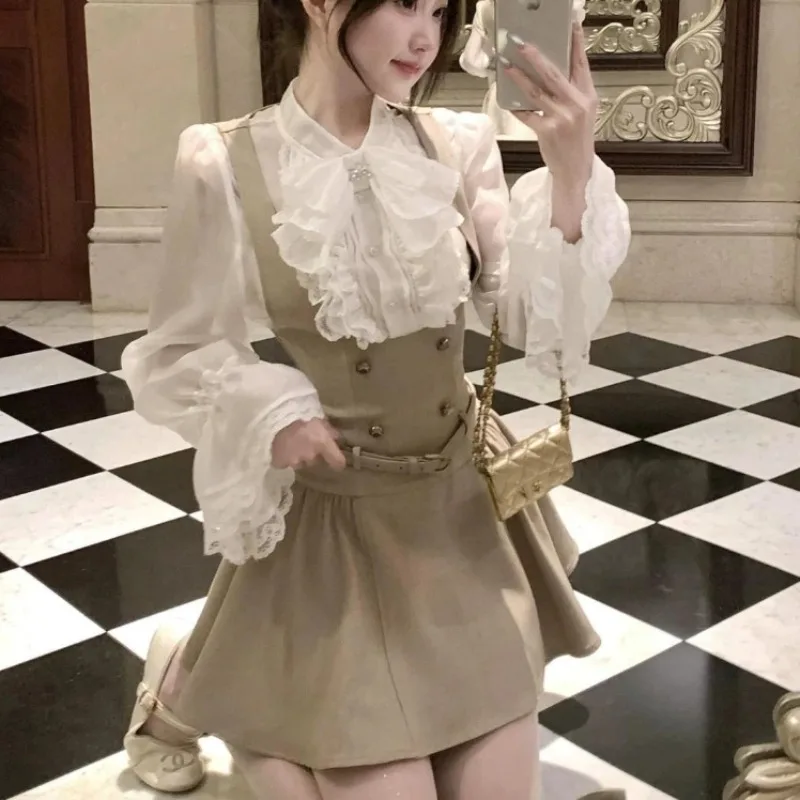 

Осенний японский популярный французский элегантный винтажный женский костюм, новый комплект из 2 предметов, кружевная рубашка + мини-юбка с лямкой на шее, шикарный женский наряд для вечеринки