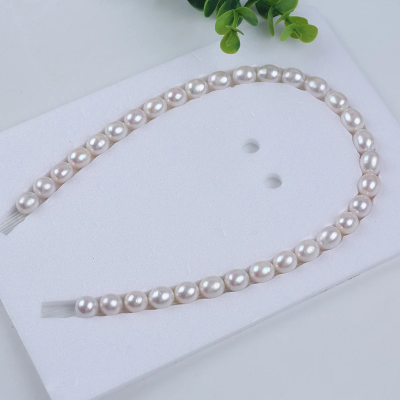 100% Nature FRESHWATER PEARL,11-12 mm AA grade high quality rice shape pearl in strand loose wholesale freshwater pearl