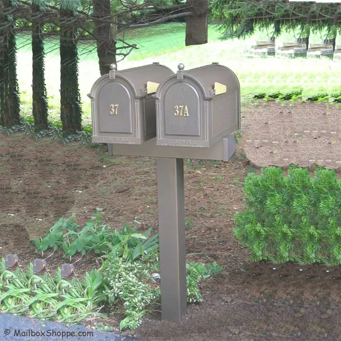 Red post mail box standing wrought iron mailbox