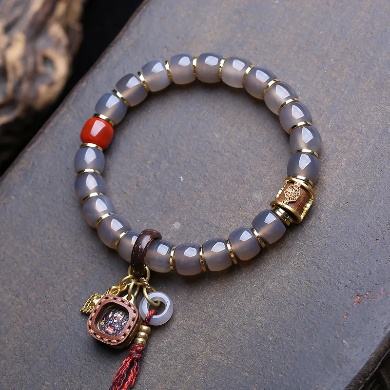 pulsera-de-color-gris-natural-de-una-sola-hebra-con-cuentas-de-estilo-antiguo-de-color-rojo-con-motivos-de-coco-de-cuero-de-vaca-con-agata-negra-de-gran-tamano-y-con-detalles-de-ma