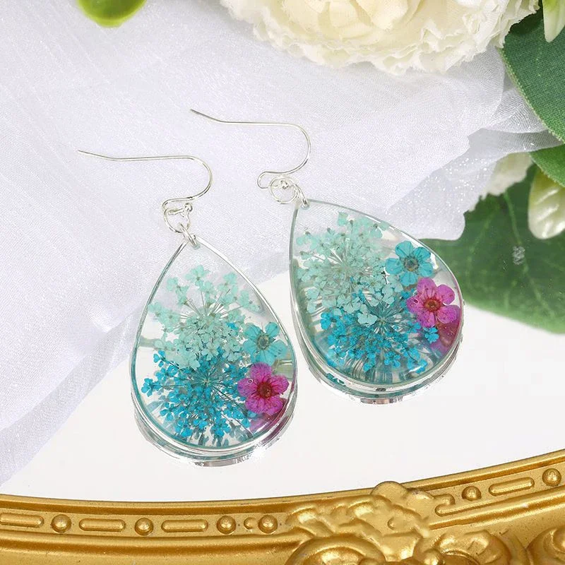 

Handmaking Pressed Flower Earring Creative Epoxy Resin Natural Flower Earring Cute Blue Floral Series Drop Earring Wholesale