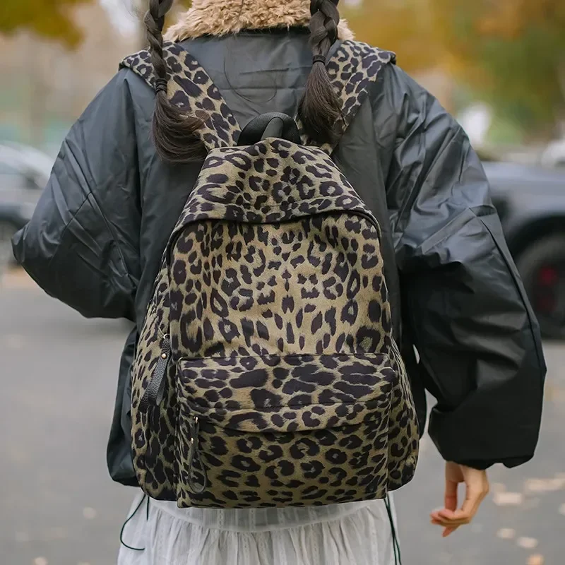 

Повседневные модные рюкзаки с леопардовым принтом, высокое качество, простые рюкзаки на молнии для женщин, новинка 2025 года, горячая распродажа, большая вместимость