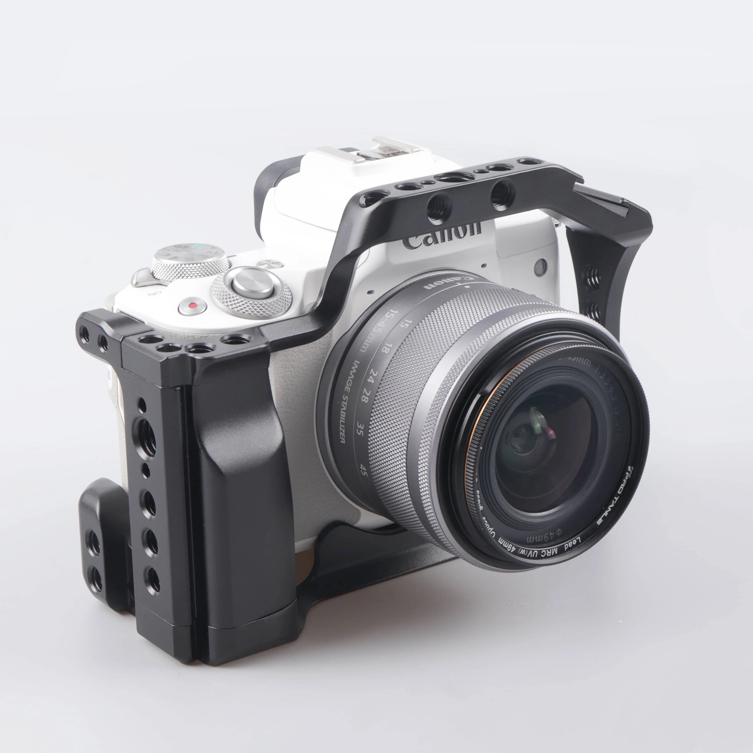 Gabbia per fotocamera DSLR professionale per Canon EOS M5 M50 M50II custodia protettiva per fotocamera cornice di estensione adatta a testa a sfera con morsetto svizzero Arca