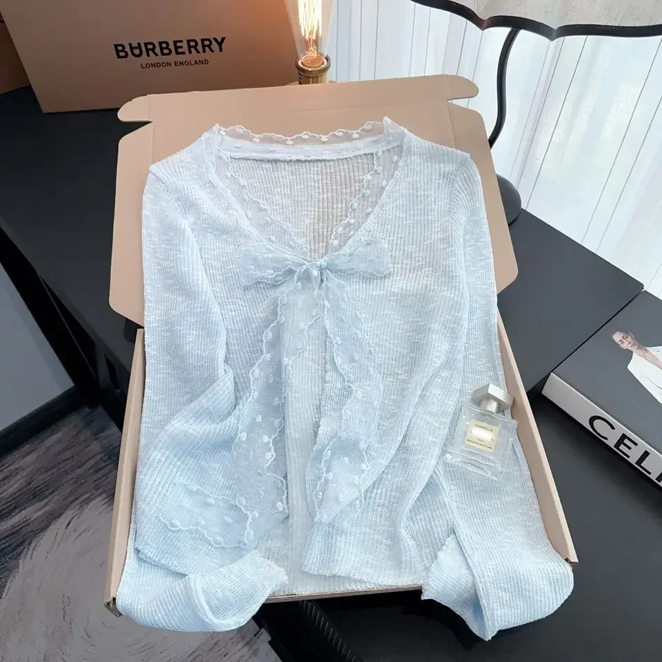 Cárdigan de punto con protección solar de encaje y lazo para mujer, novedad de verano, Top holgado con cuello en V, versión coreana, abrigo versátil de manga larga de Color sólido