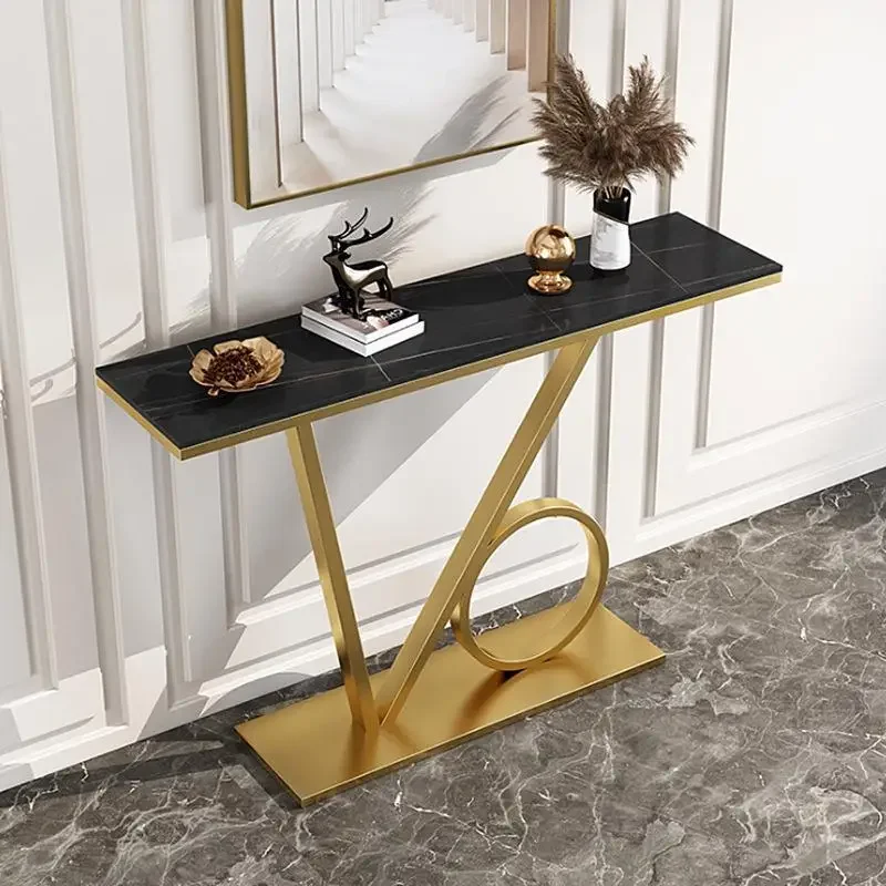 small thin metal stands with black and gold marble panels luxury modern console watches