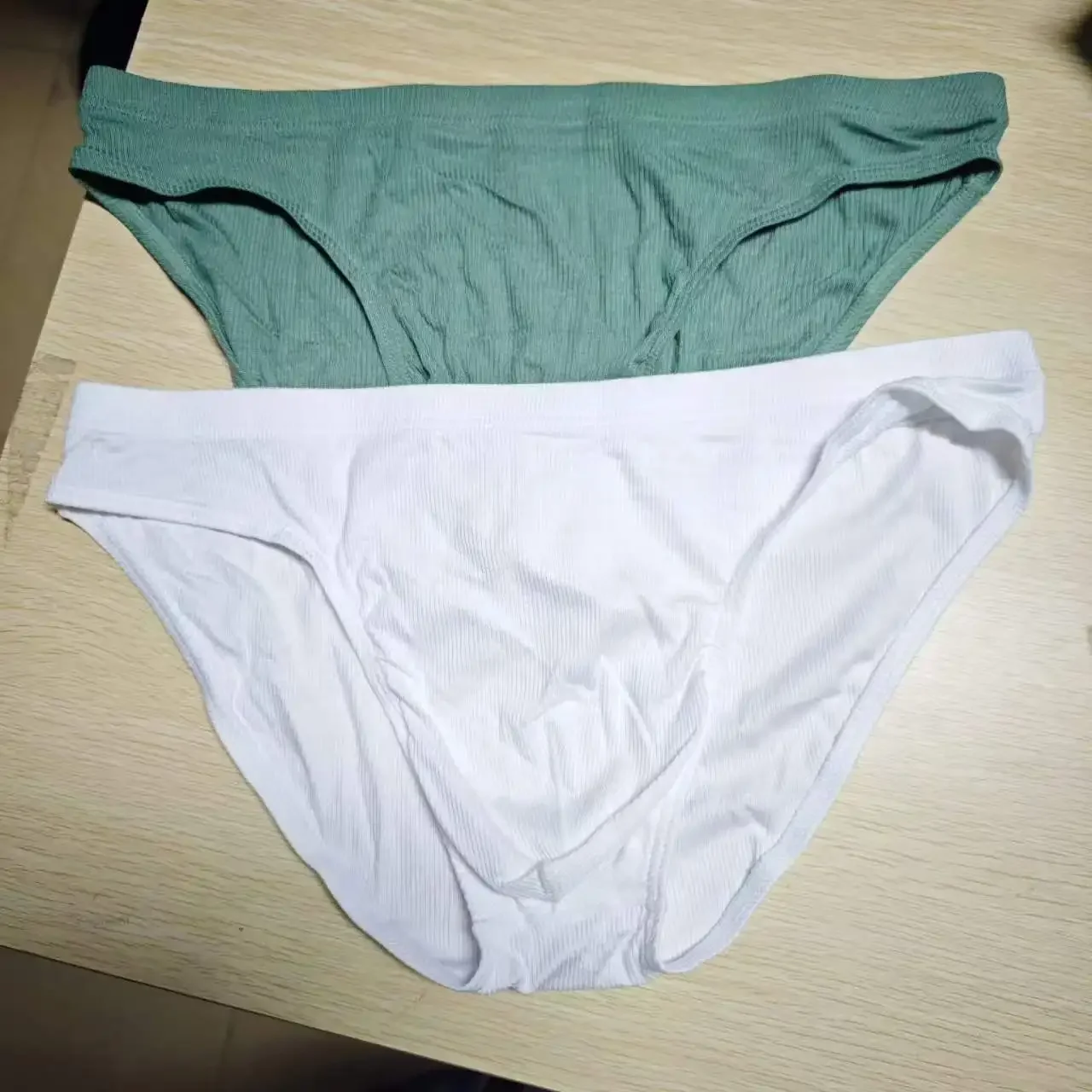 2026new Solid color men's briefs one-piece low waist triangle breathable youth underwear solid color loose pants D2024