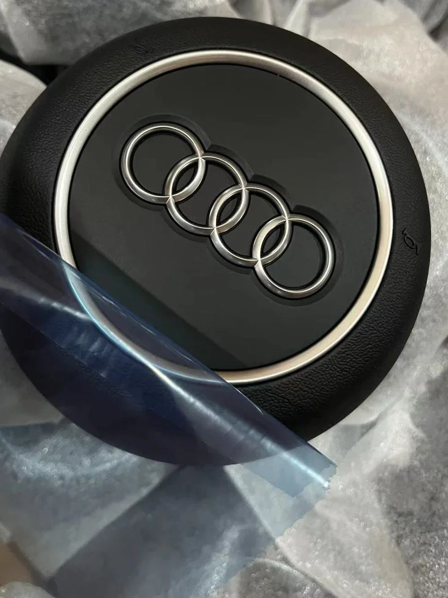 

Suitable for Audi A4LB9. Steering wheel cover. Steering wheel speaker cover. Horn cover shell. Original small defects