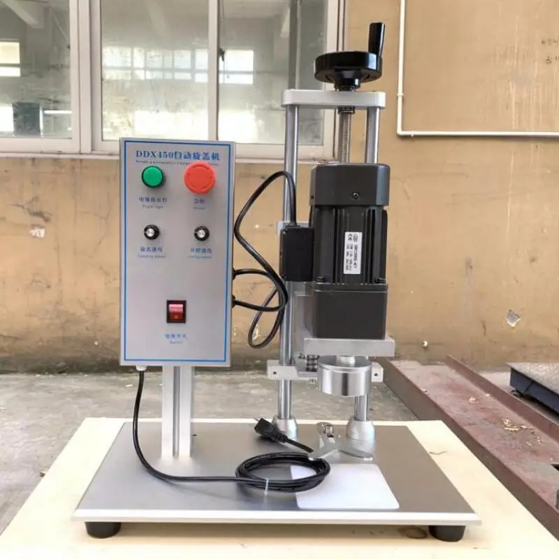 آلة تغطية الأغطية الأوتوماتيكية ، غطاء لولبي دائري ، جهاز كابر لولبي تلقائي ، غطاء زجاجة ، قفل محكم ، دوار ، Ddx450 ، سطح مكتب