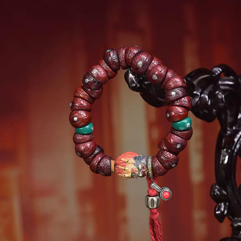 Natural jadeified old material Tibetan-style phoenix-eye bodhi with copper inlay, large intestine beads, decorative bracel