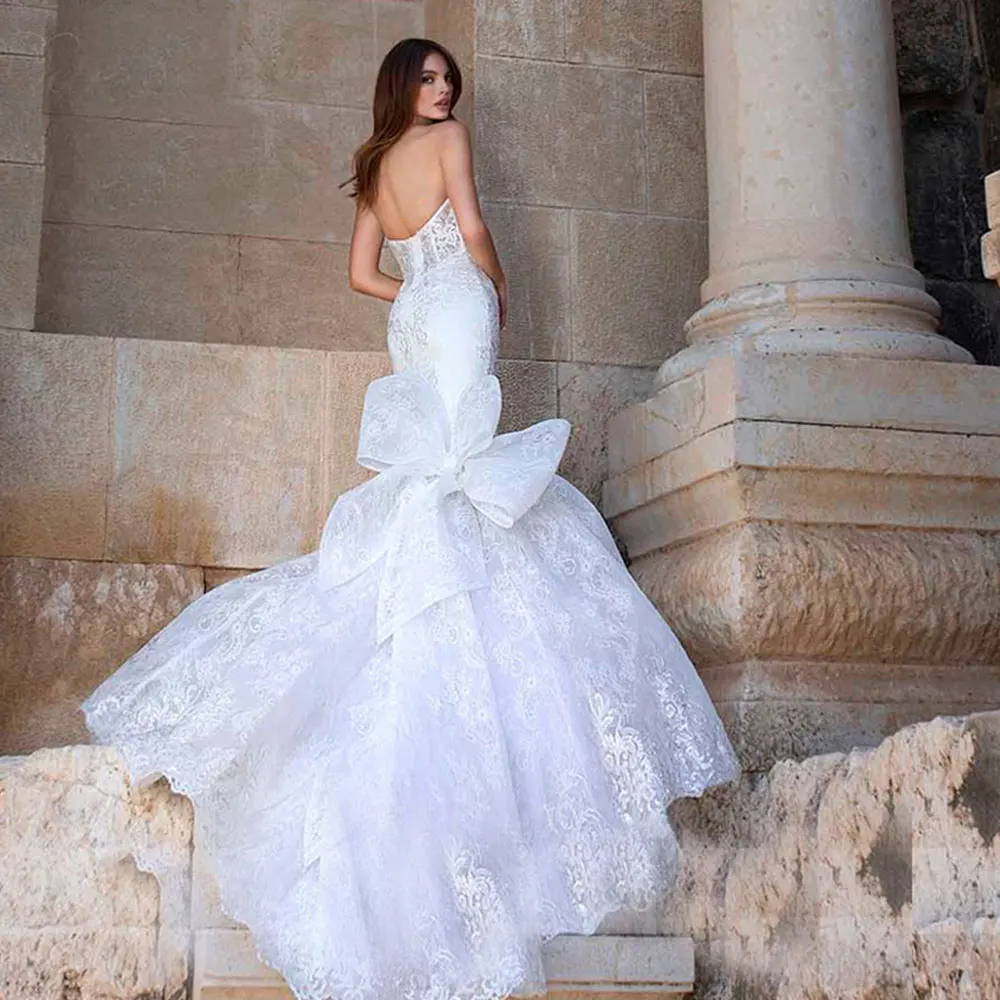 Vestidos de novia de encaje de sirena con cuello en V profundo, blanco, elegante, Espalda descubierta, vestido de fiesta de boda de playa, tren de lazo grande de novia, nuevo diseño