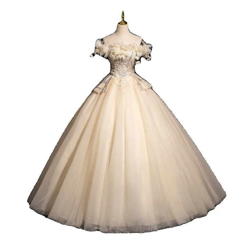 2025 Neues Damen-Sommerkleid mit Champagner-Mesh-Stickerei und einer Schulter, modisches und süßes Bankett-Anhänger-Puffrock