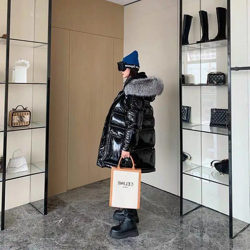 Piumino invernale da donna nuovo 2025 Giacca impermeabile antivento con cappuccio per pendolari allentata