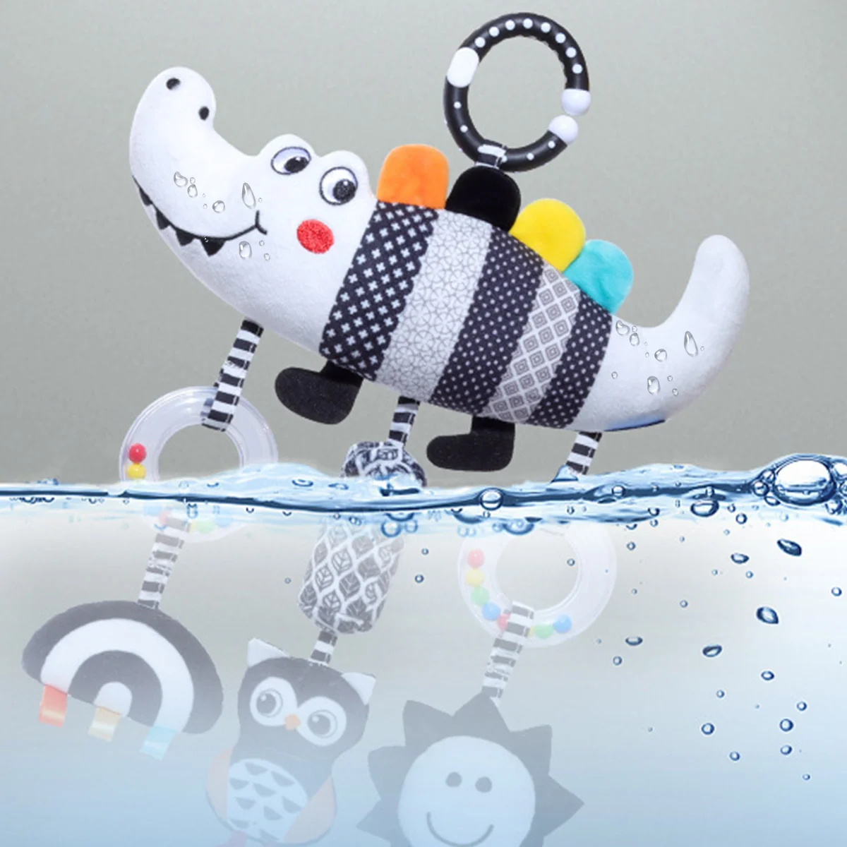 Peluche a Forma di Coccodrillo con Musica e Sonaglio, Giocattolo Sensoriale per Bambini e Bambine per Stimolare le Capacità Cognitive