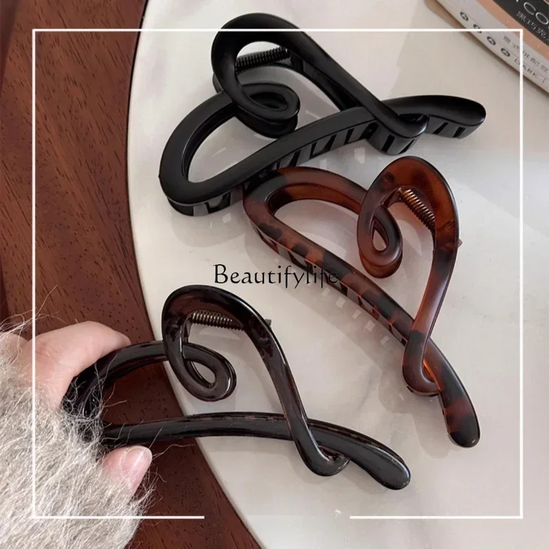 

Elegant Matte Black Love Grip Women's High Sense Shark Clip Headdress