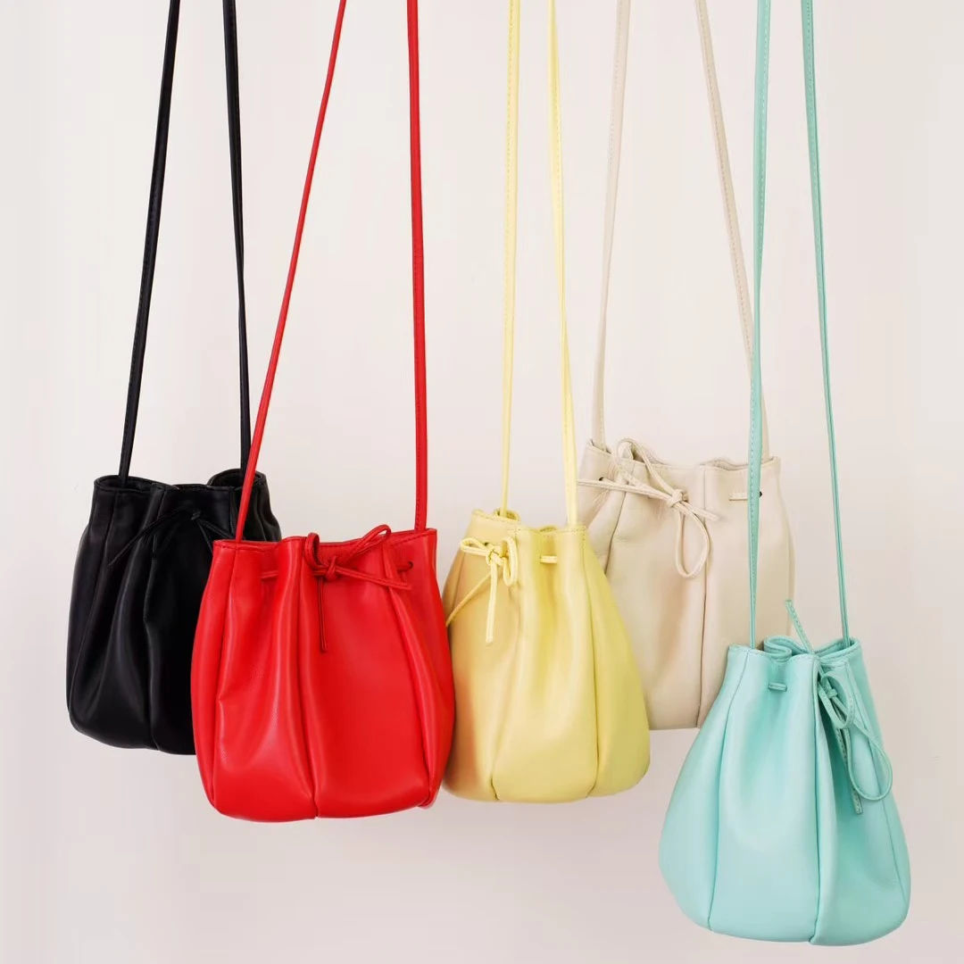 Sheepskin drawstring bucket bag 2025 new spring niche design genuine leather shoulder bag soft women's mini yellow crossbody bag - Image 4