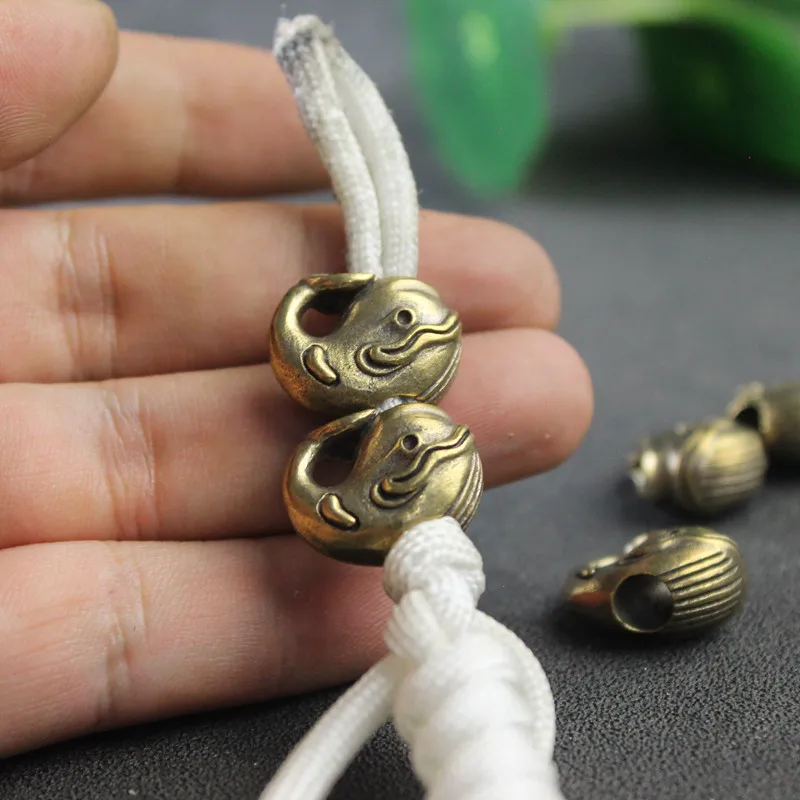 

Cute Whale Brass Knife Beads EDC Outdoor DIY Paracord Accessories Handmade Woven Lanyard Pendants Jewelry Umbrella Rope Hangings