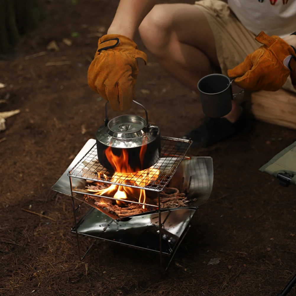 حامل النار المحمول للتخييم والشواية القابلة للطي والتخييم والشواية النارية المصنوعة من الفولاذ المقاوم للصدأ للتخييم في الساحات الخلفية الخارجية