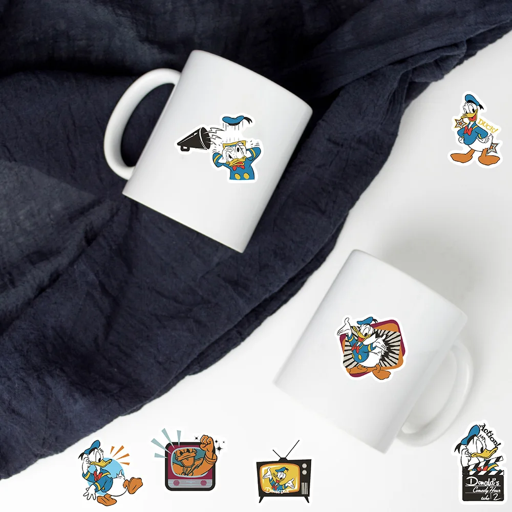 50 قطعة الوقت الكوميدي دونالد داك ملصقات الكمبيوتر المحمول الأمتعة سكرابوكينغ دراجة نارية DIY بها بنفسك القهوة الهاتف حقيبة الكمبيوتر الكتابة على الجدران الشارات