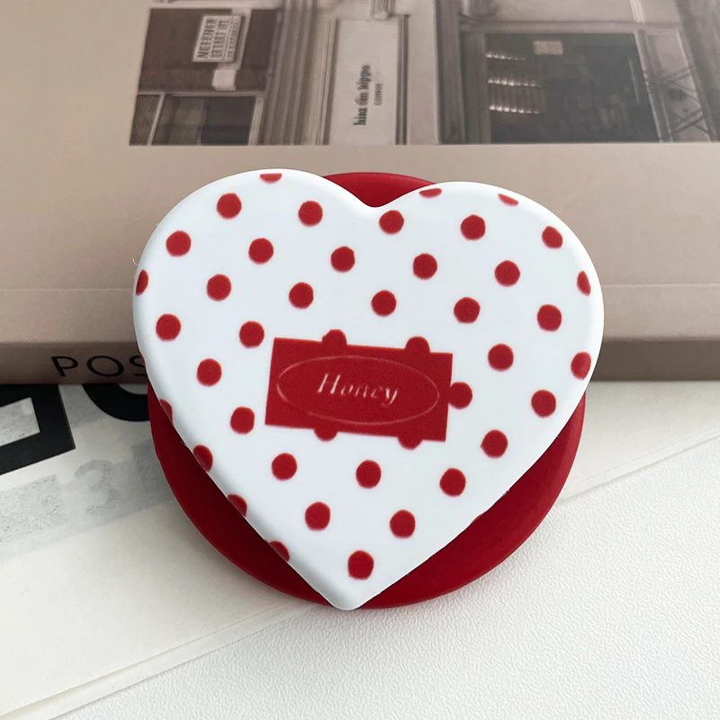Funda de Lujo Plegable con Bolitas y Corazones Rojos Adorables para iPhone 17, Soporte Magnético Griptok para Celular Magsafe