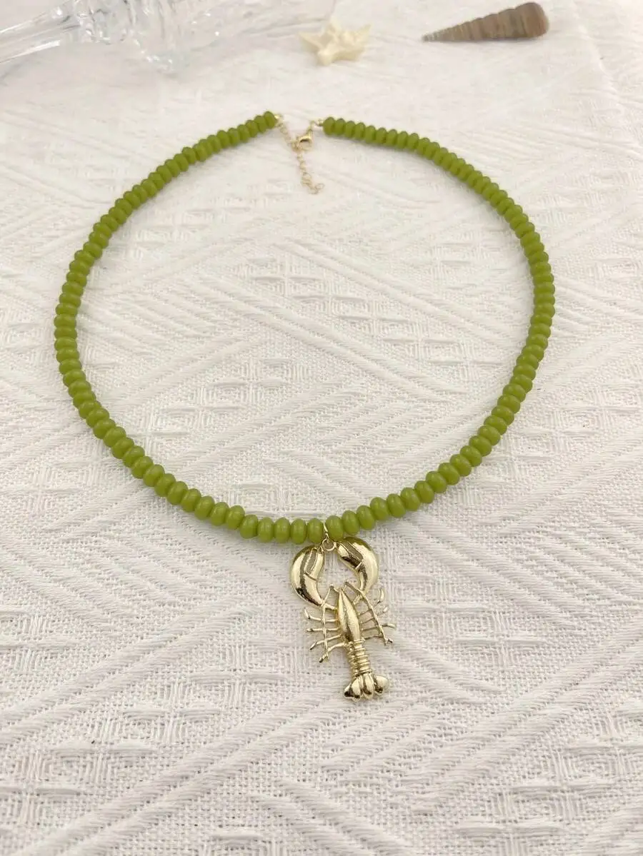 

Green Beaded Pendant Necklace With Lobster Charm Bohemian Ocean Style