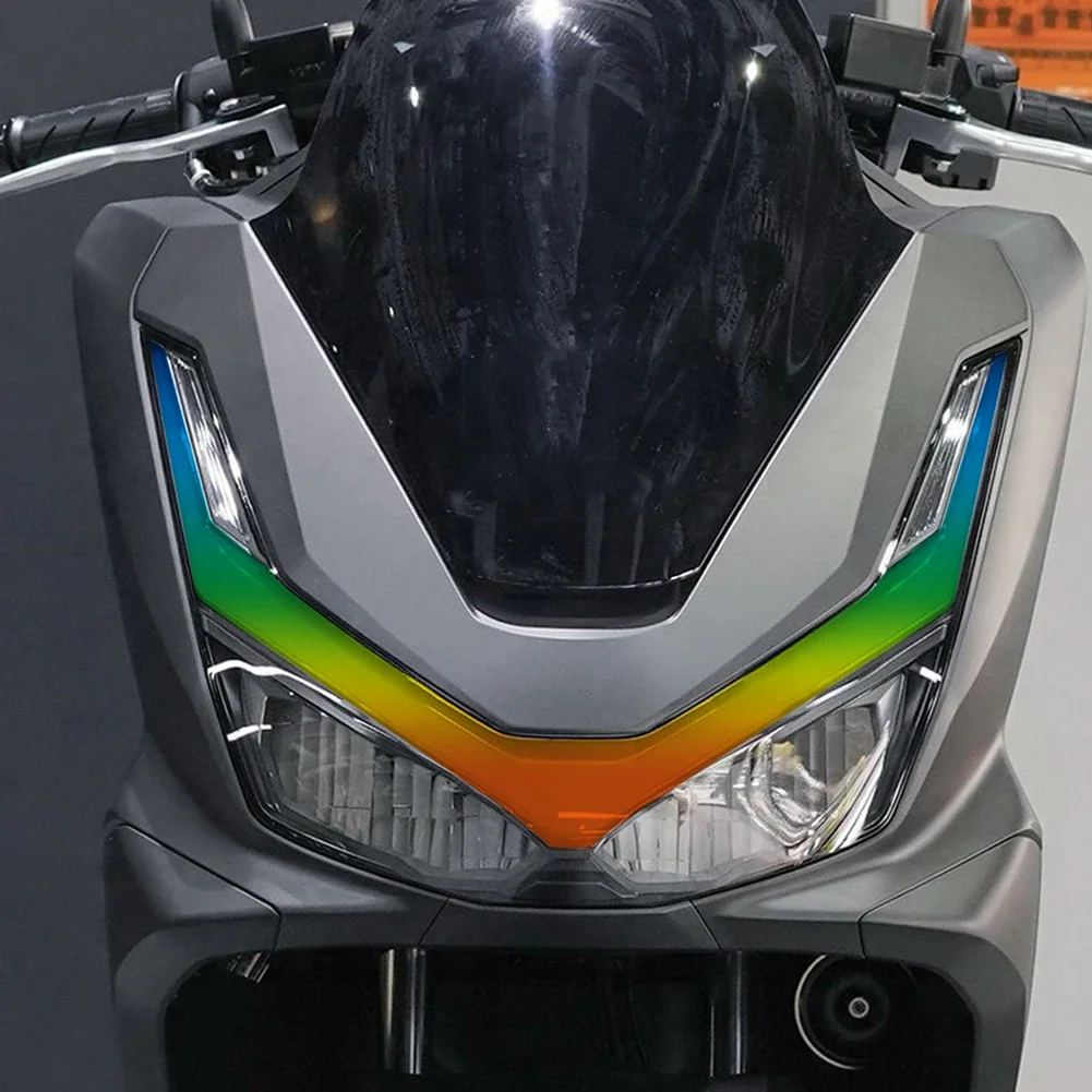 

2Pcs Motorcycle Headlight Stickers Vinyl Protective Film Decorative Stripe Headlight Tint Protection Layer for 2025 Honda PCX160