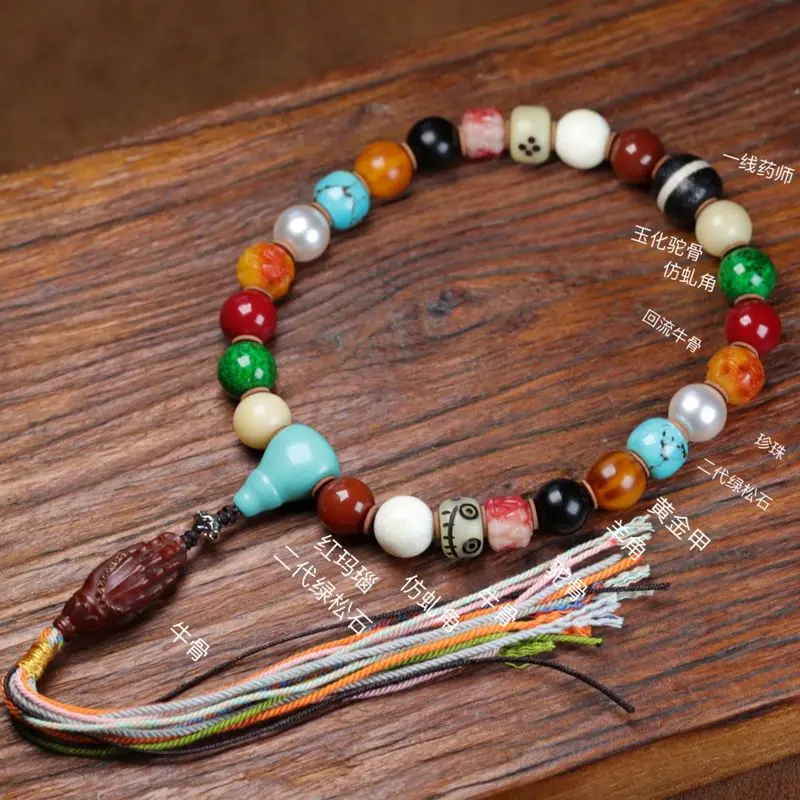 Jewelry multi-treasure bracelet with handheld prayer beads and horn-shaped pearl accents