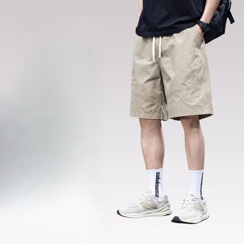 Celana Pendek Kargo Pria Panjang Solid Bermuda dengan Tali Tarik Celana Pendek Pinggang Setengah Elastis Longgar Lebar untuk Pria Desainer Saku