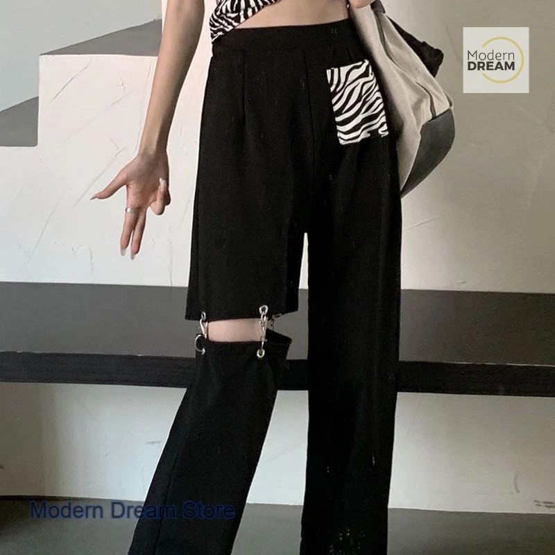 

Korean hollow wide-leg pants casual pants women's summer new retro fashion design pants loose casual high waist straight pants.