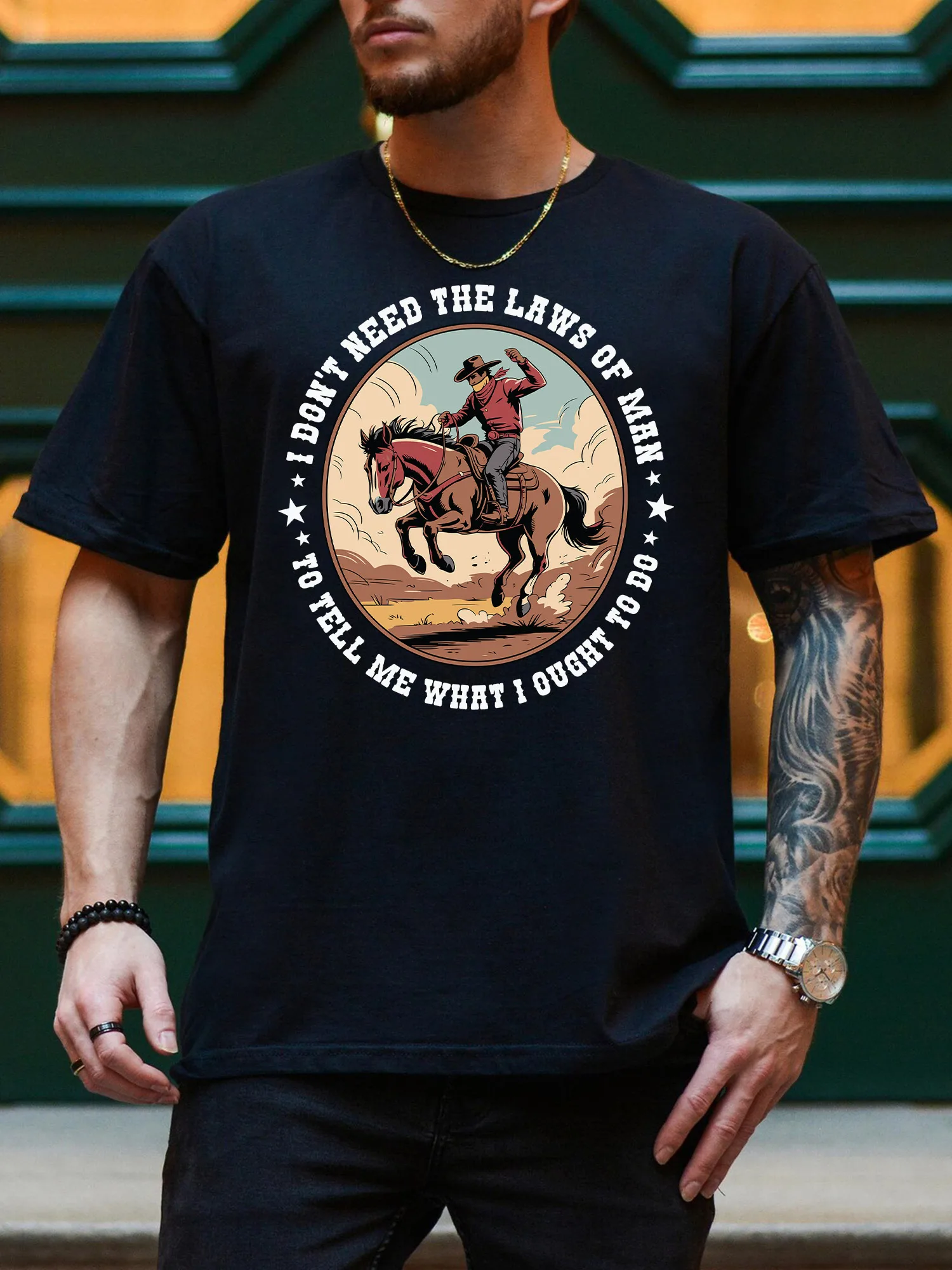 

Cowboy Needs No Laws Men's Graphic Tee, Pure Cotton Casual Black T-Shirt, Lightweight Round Neck Tee