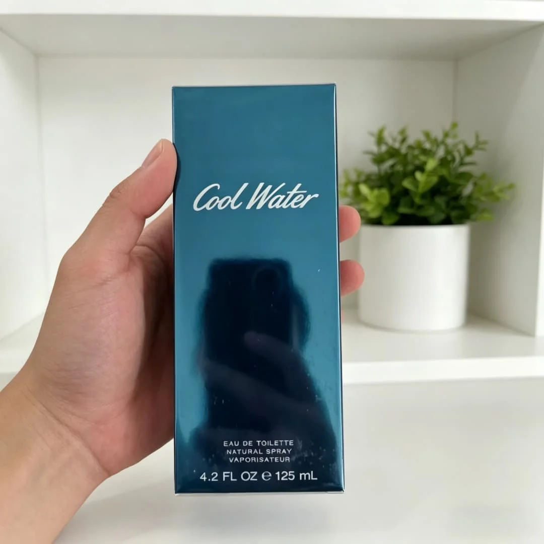 Davidoff Cool Water Eau de Toilette (125ml) Diseño Azul Verdoso Atemporal: Botella icónica de vidrio azul verdoso, un símbolo de frescura acuática.